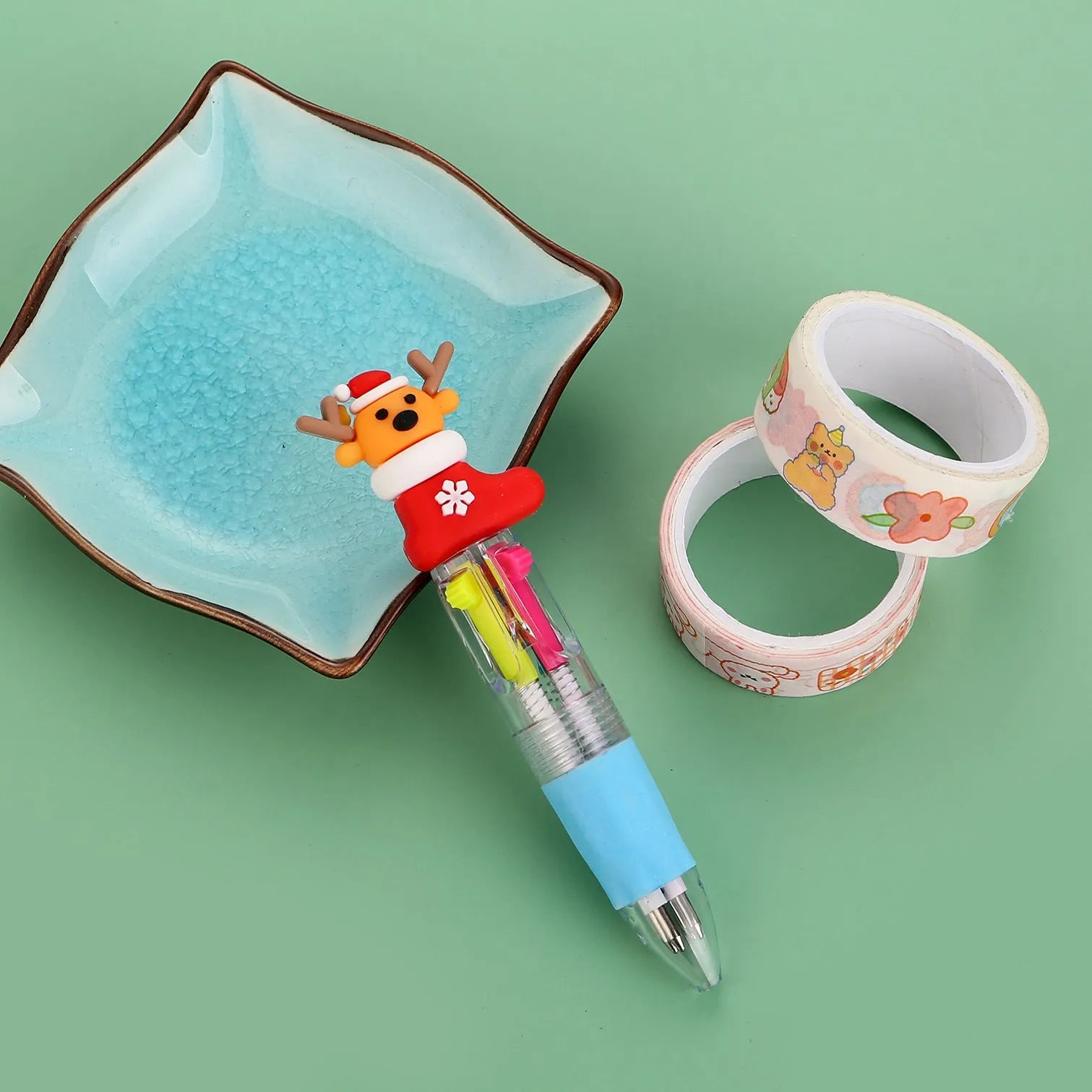 Compact 11cm Christmas four-colour ballpoint pen with press mechanism in festive designs