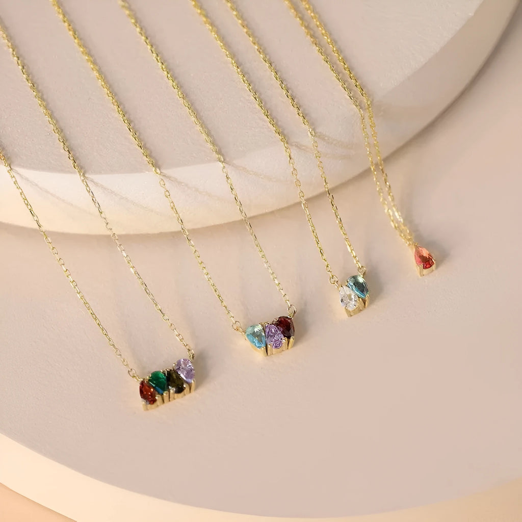 Zircon birthstone pendant necklace on titanium steel chain in silver, gold, or rose gold.