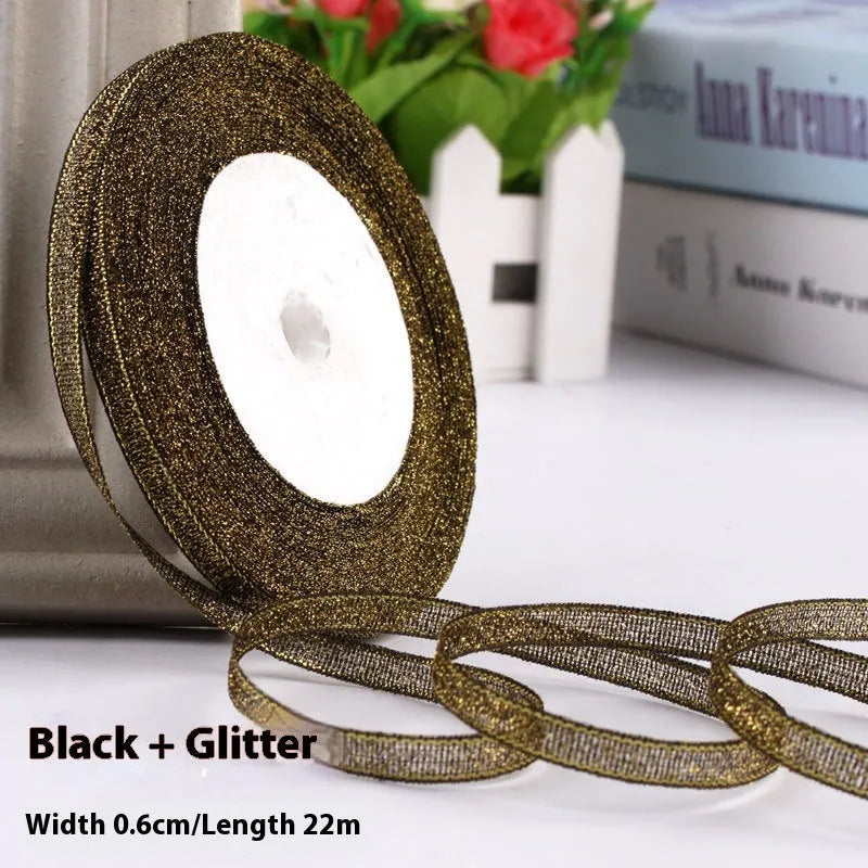Roll of 0.6cm wide coloured polyester gift ribbon with 22 metre length.