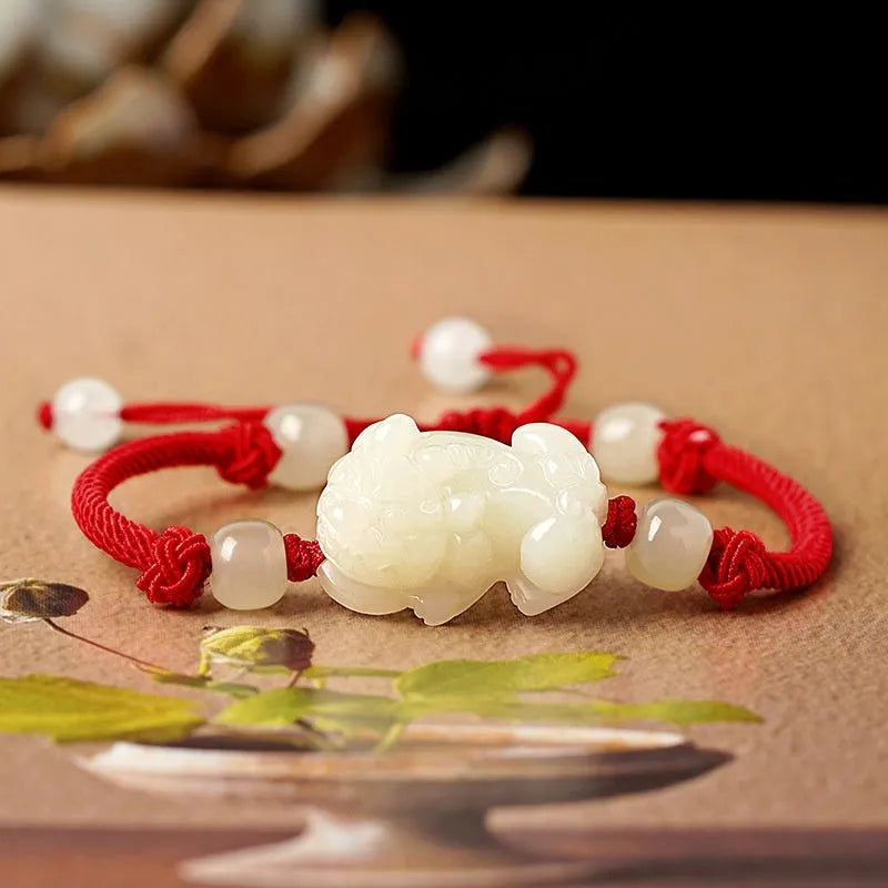 Traditional Chinese Hetian Jade bracelet with braided rope band and jade beads