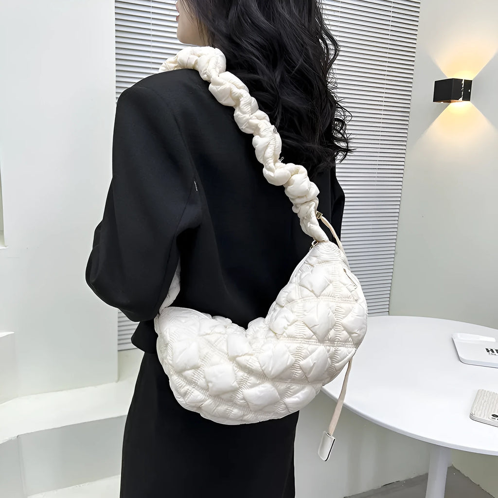 Women's nylon shoulder messenger bag in a solid colour with a long strap, showing front view.