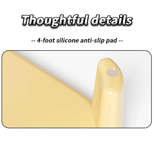 Milk yellow oversized plastic cat litter mat with anti-slip silicone feet on a floor next to a litter box.