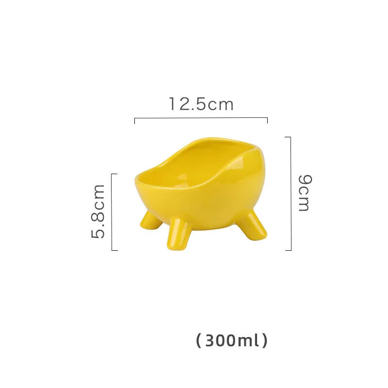Green ceramic pet bowl with four-legged stable base and wide-mouth design