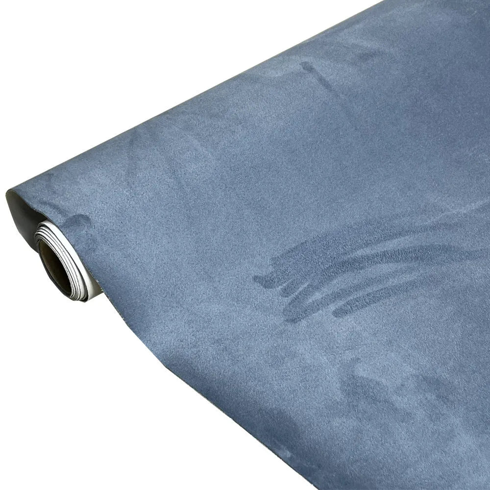 A sheet of self-adhesive black leather suede material with a ruler showing its 0.5mm thickness.