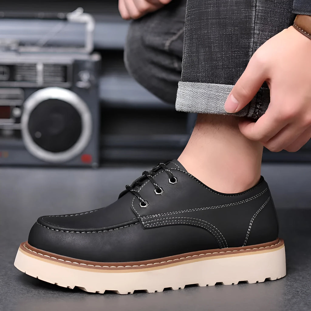 Men's black retro Martin boots with low-top design, round toe, and rubber sole