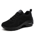 Red and black women's low-top mesh sneakers with round toe and front lace-up closure.