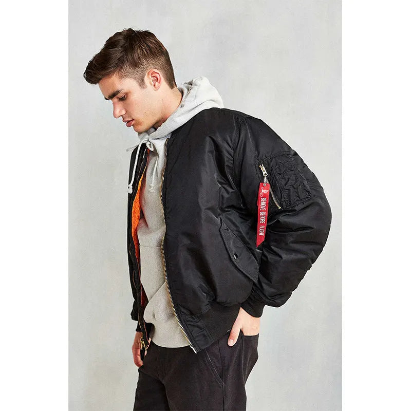 Men's loose fit cotton-padded nylon pilot jacket in army green on a hanger.
