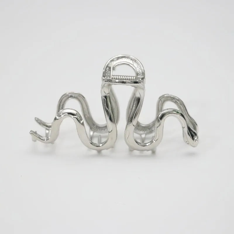 Silver metal hair clip with Slytherin serpentine snake design measuring 10.5 cm