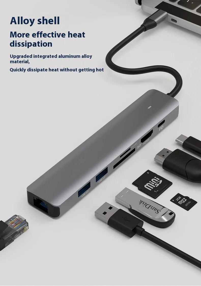 7-in-1 card reader and USB hub for laptops with multiple interface ports
