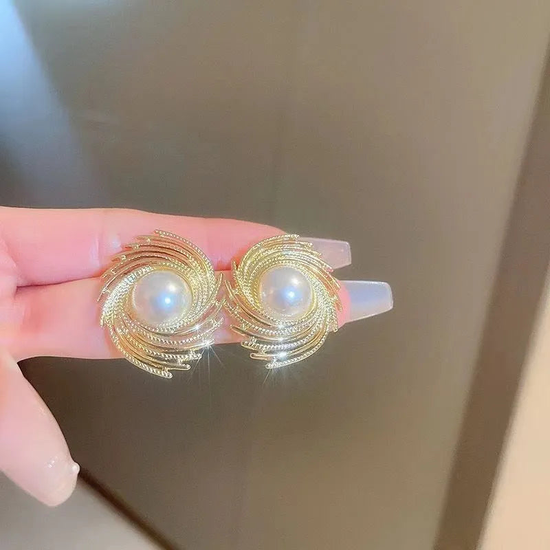 Women's vintage pearl earrings with irregular flower shape design