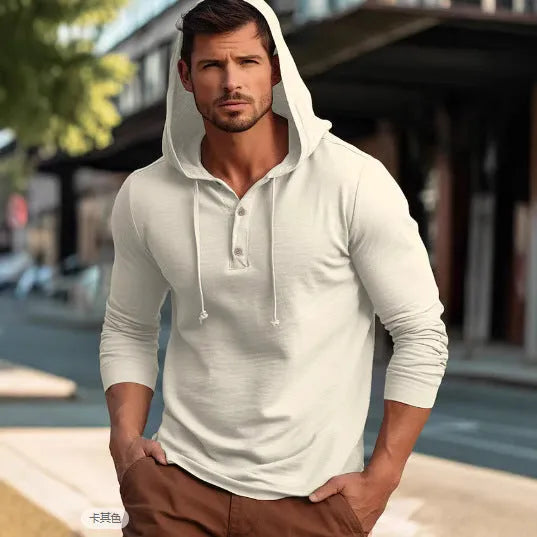 A cotton pullover hoodie for youth in dark blue, shown in a casual setting.