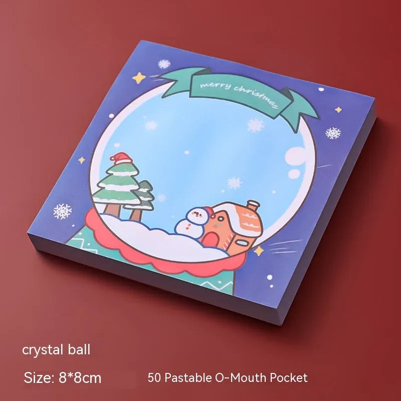 Christmas sticky notes pad showing eight festive designs including Santa Claus, elf, snowman, and gift box