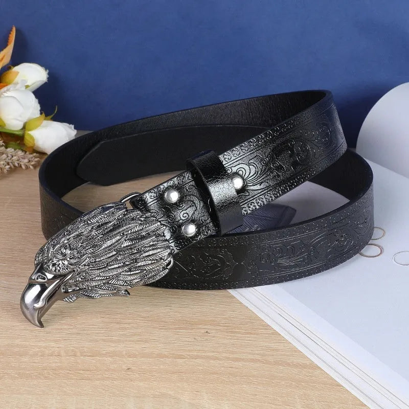 Men's black imitation leather belt with a metallic alloy cow head buckle and pin buckle fastening