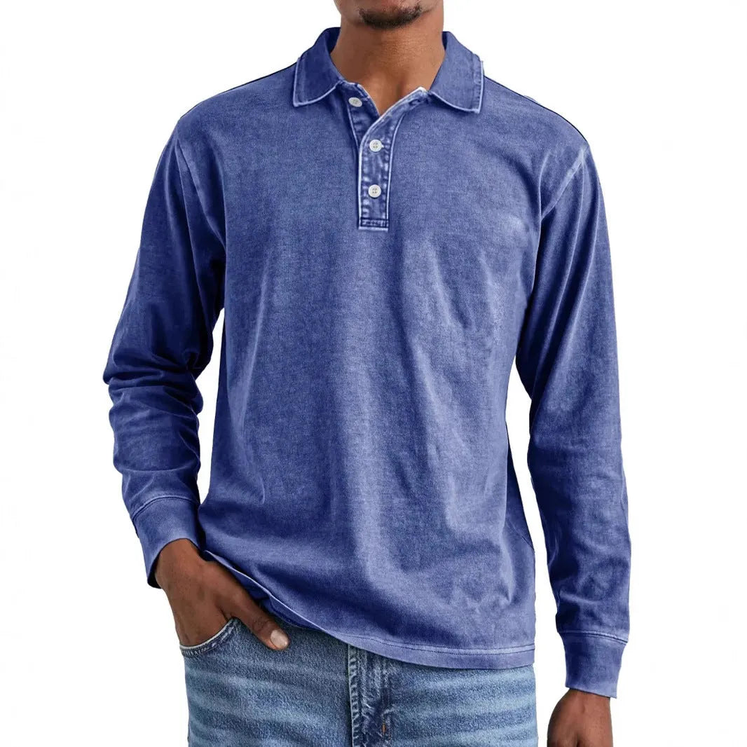 Man wearing a retro washed distressed cotton lapel long sleeve polo shirt in army green.
