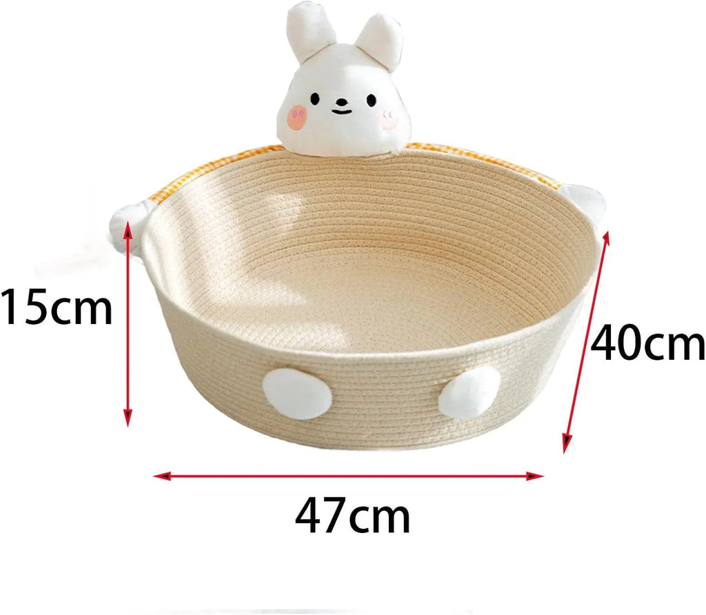 Woven cotton rope basket serving as a cat bed and scratcher in a natural colour.
