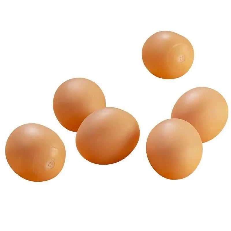 Egg-shaped dog toy with textured surface for tooth cleaning and sound feature