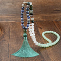 81cm long bohemian necklace with geometric gemstone pendant and 108 natural stone tassels.