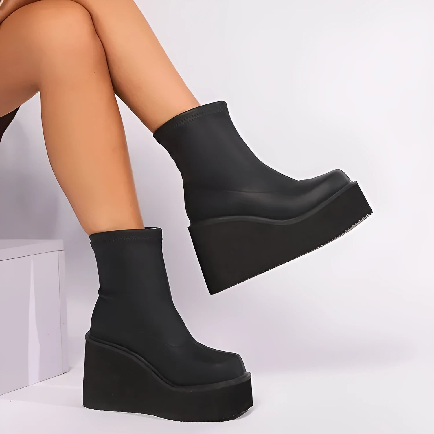 Plus size women's wedge heel boots with waterproof platform sole in black leather