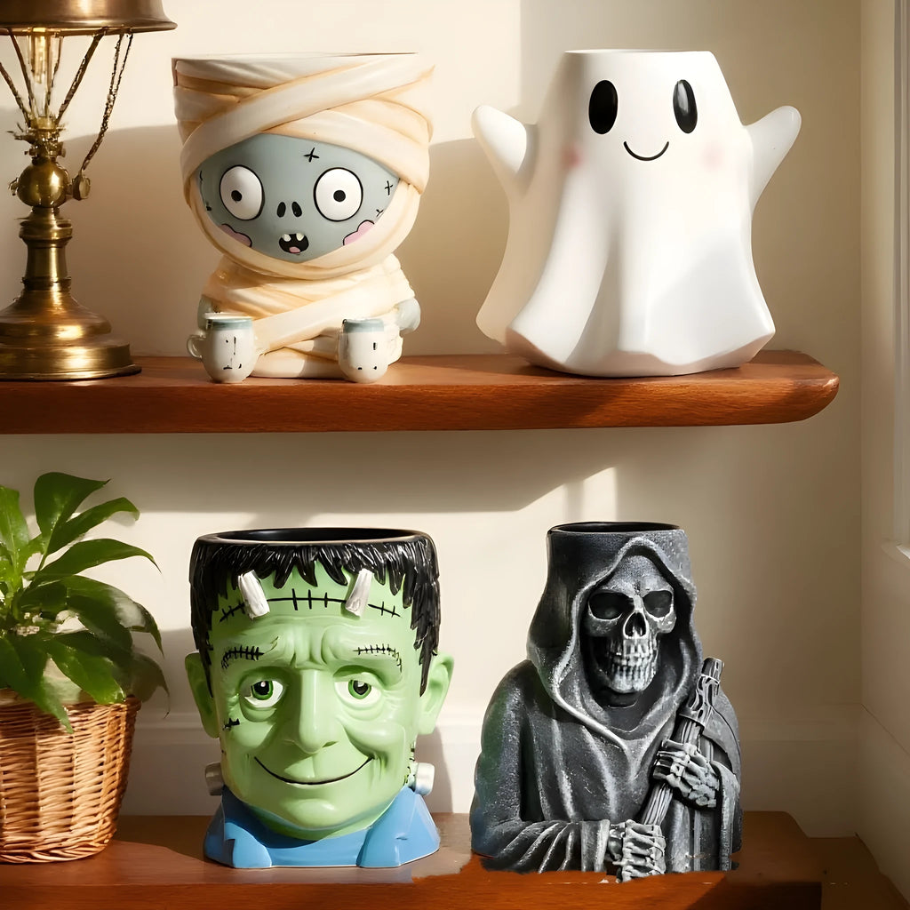 Hand-painted Halloween resin flower pot decorations showing Bandage Zombie, White Ghost, Frankenstein and Death designs.