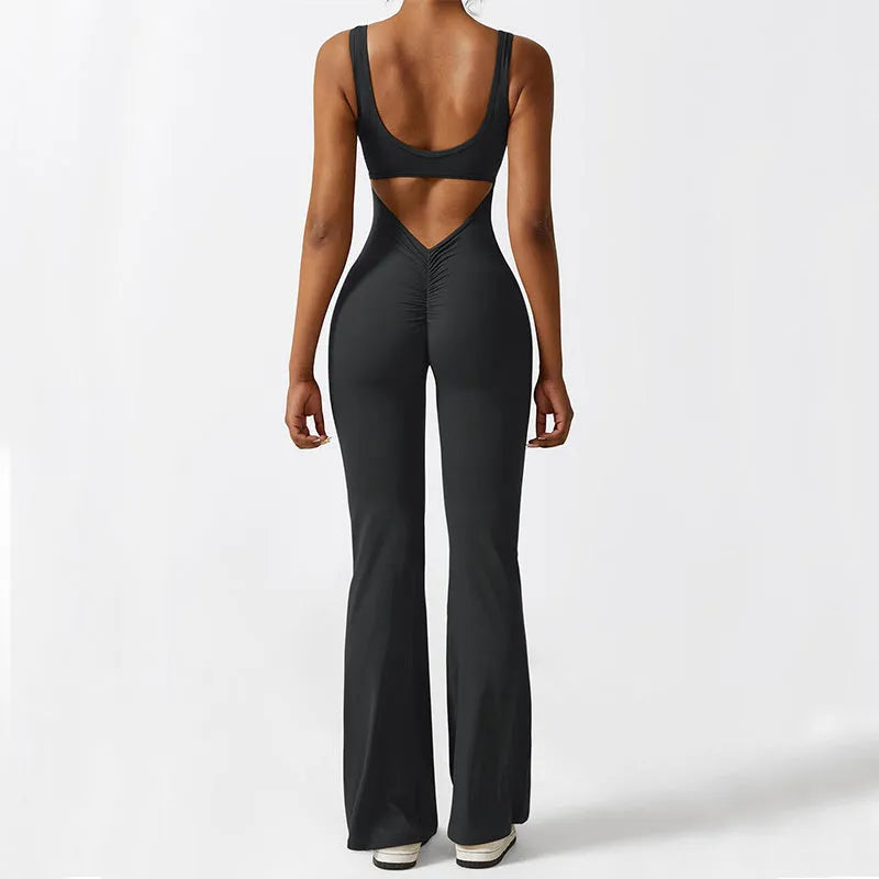 Women's sleeveless flare jumpsuit for yoga and fitness in high-elasticity polyester fabric.