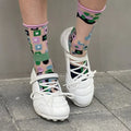 Women's silver lace-up bow sports shoes with a low-top and round toe on a white background.