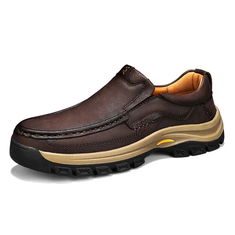 Men's black mountaineering shoes with thick rubber soles and round toe design for outdoor hiking
