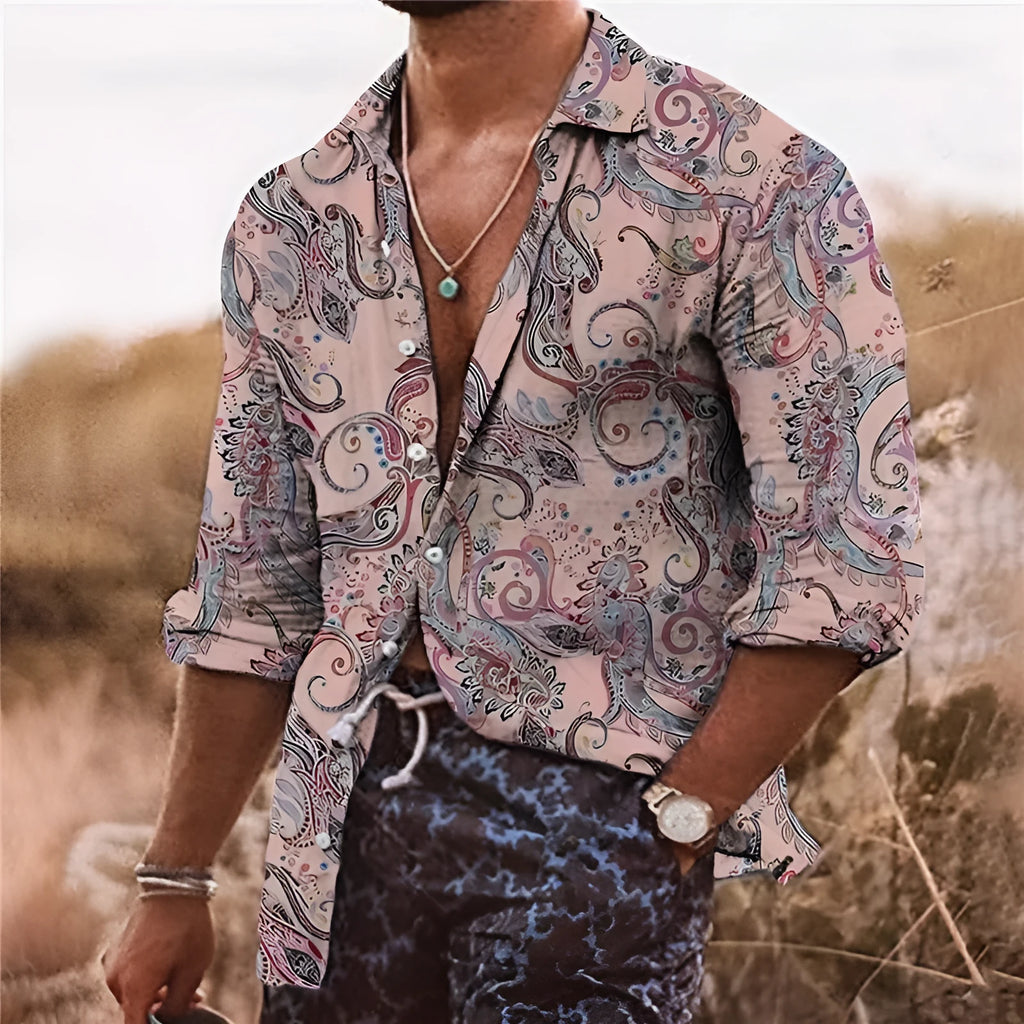 Man wearing a loose-fit long sleeve shirt with a vibrant 3D digital print floral pattern.