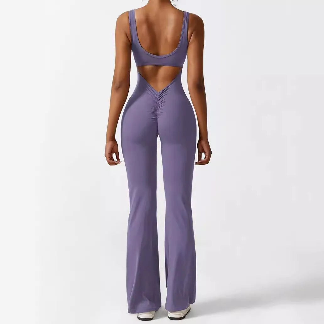 Women's sleeveless flare jumpsuit for yoga and fitness in high-elasticity polyester fabric.
