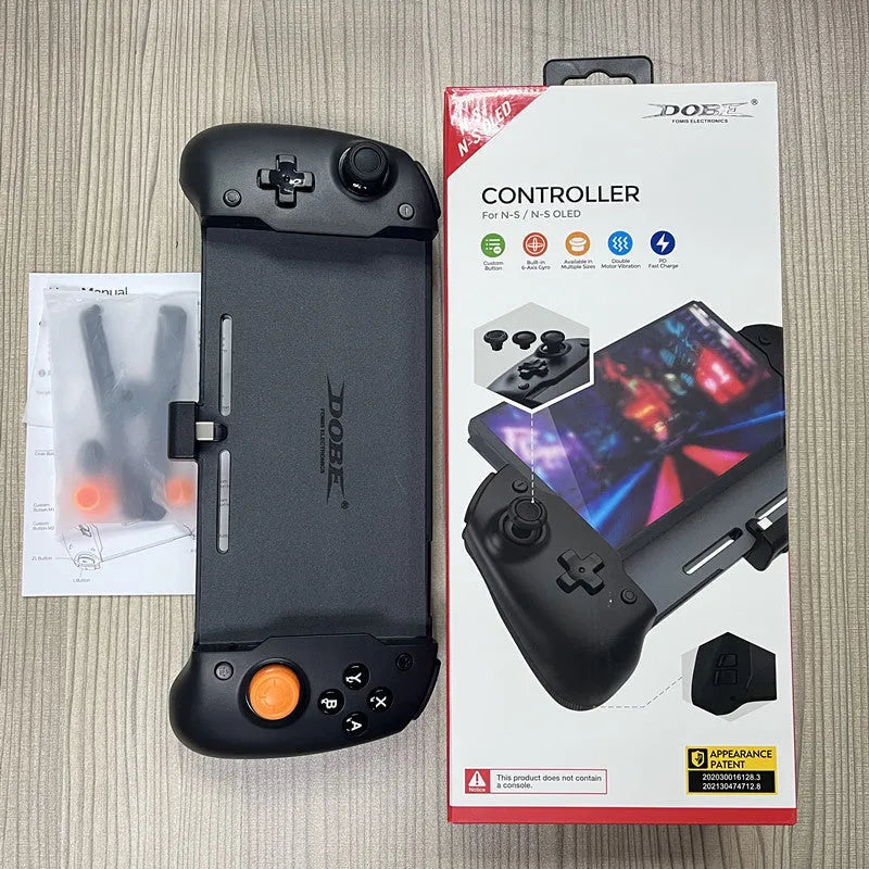 Black portable Switch gamepad attached to Nintendo Switch OLED console showing controller layout
