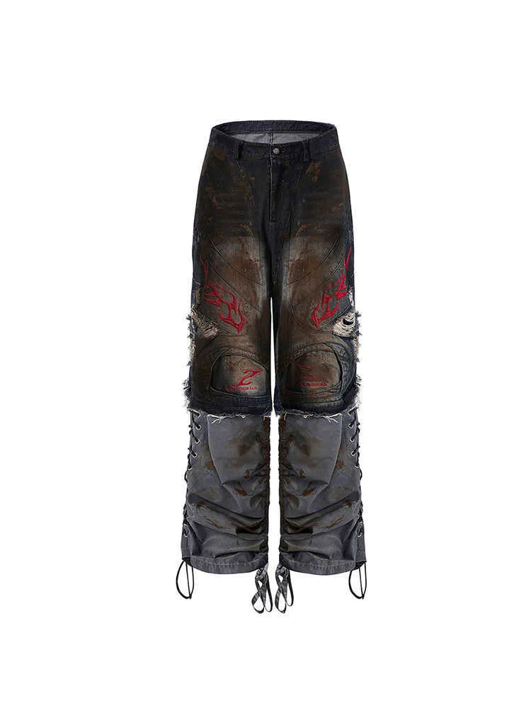 Men's retro jeans with detachable trouser legs showing loose wide-leg fit in picture colour denim