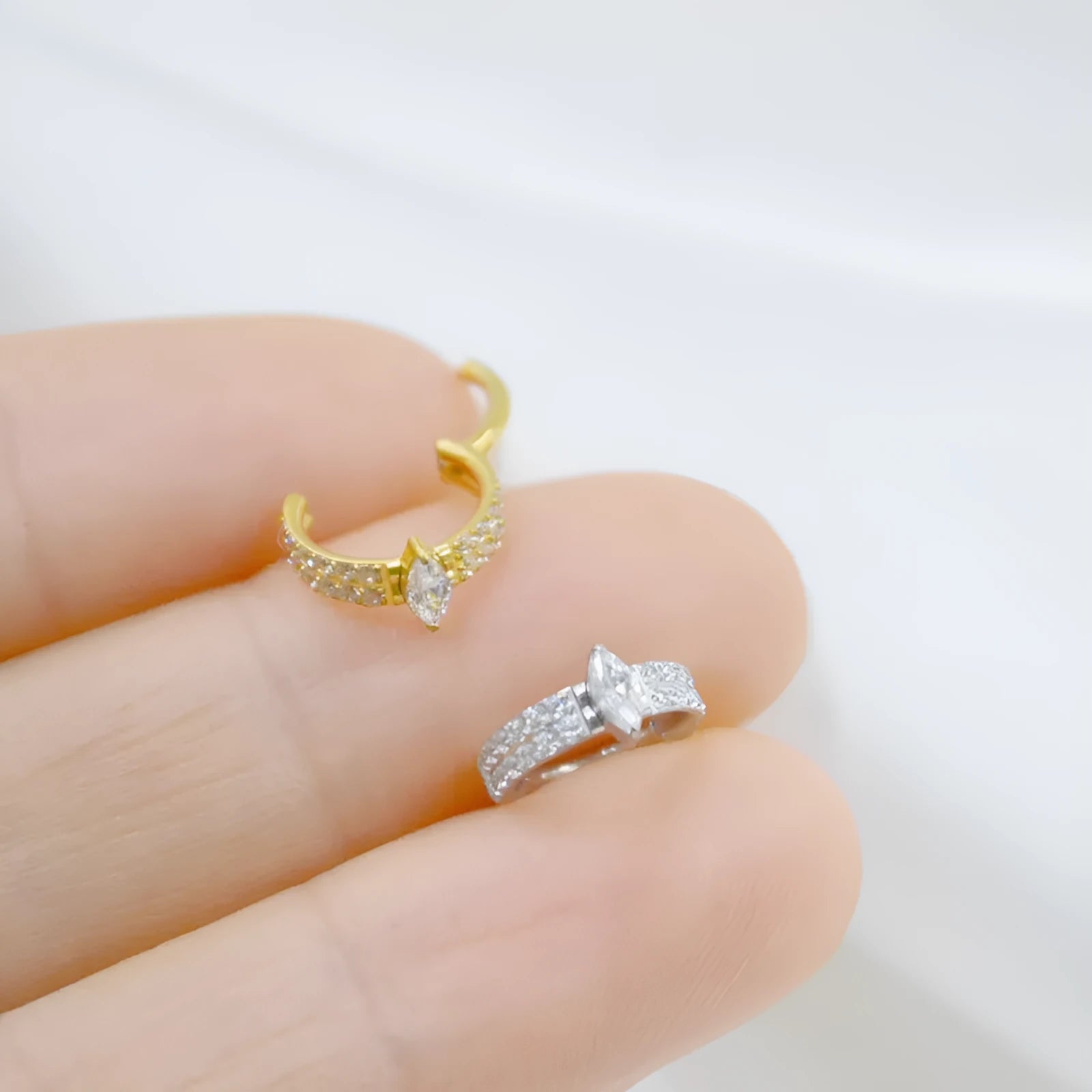 Titanium steel heart-shaped earrings with zircon stones in gold and silver colours