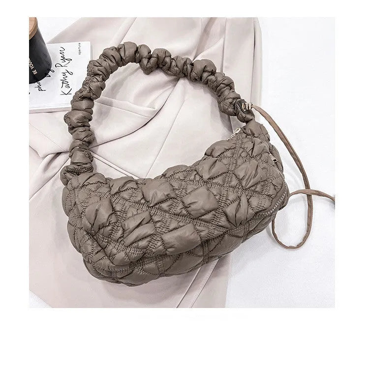 Women's nylon shoulder messenger bag in a solid colour with a long strap, showing front view.