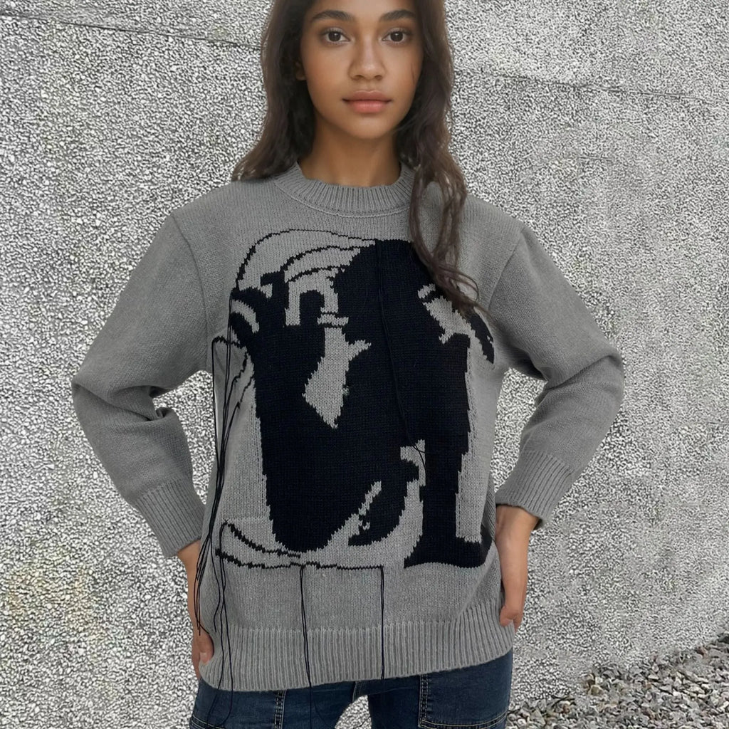 Women's loose fit alpaca wool sweater with tassel design and abstract pattern in street fashion style