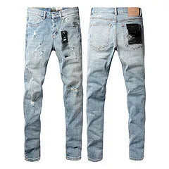 A pair of black slim fit skinny jeans with a straight leg and button fly closure on a mannequin.