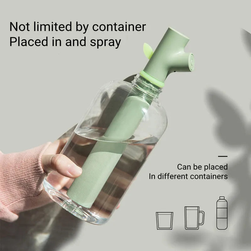 Transparent portable USB humidifier with round design and water bottle attachment