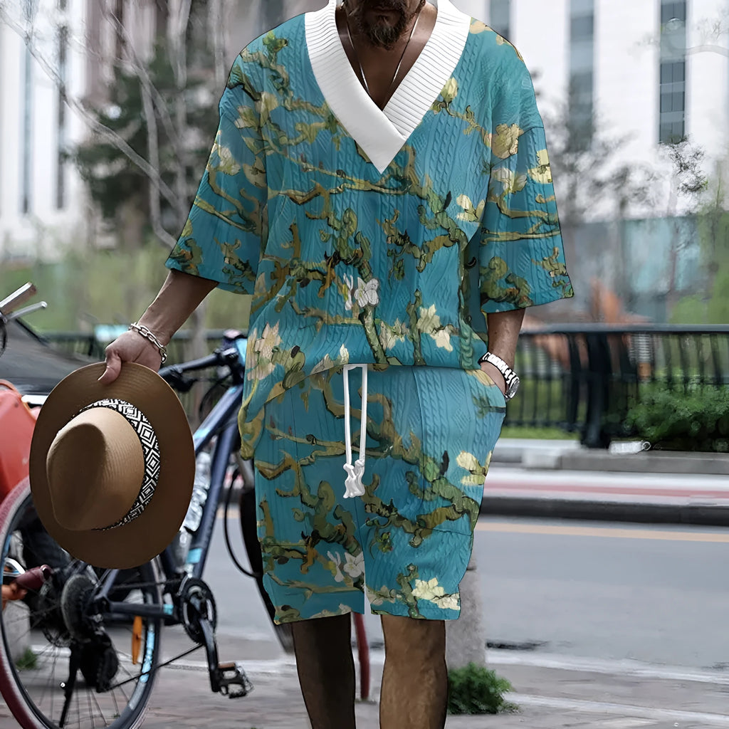 Men's peacock blue knitted shorts suit with 3D printed design showing front view of complete leisurewear set