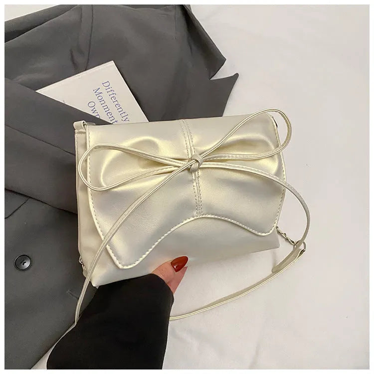 Women's black PU leather crossbody underarm bag with horizontal square shape and sewing line detail
