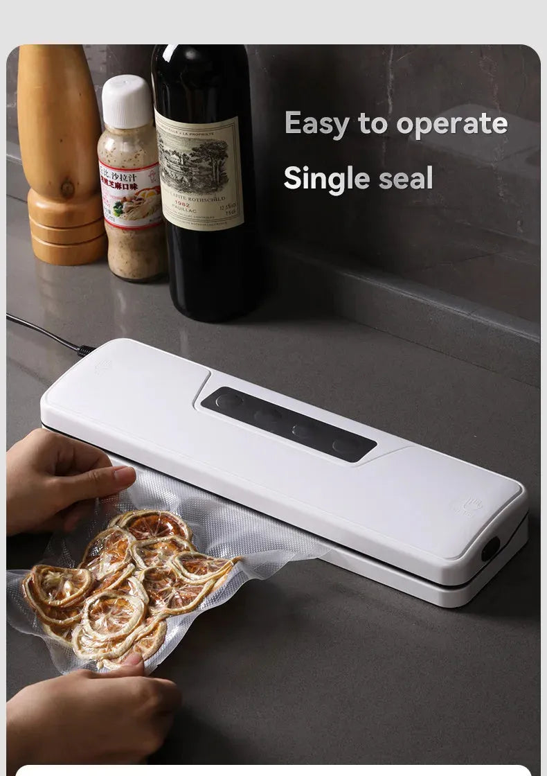 Compact white automatic vacuum sealer machine for household food preservation and item storage