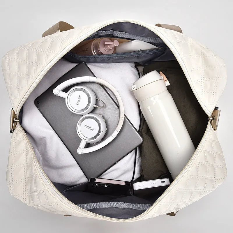 Large Oxford cloth leisure travel holdall in a street style, shown in a solid colour with sewing thread detail.