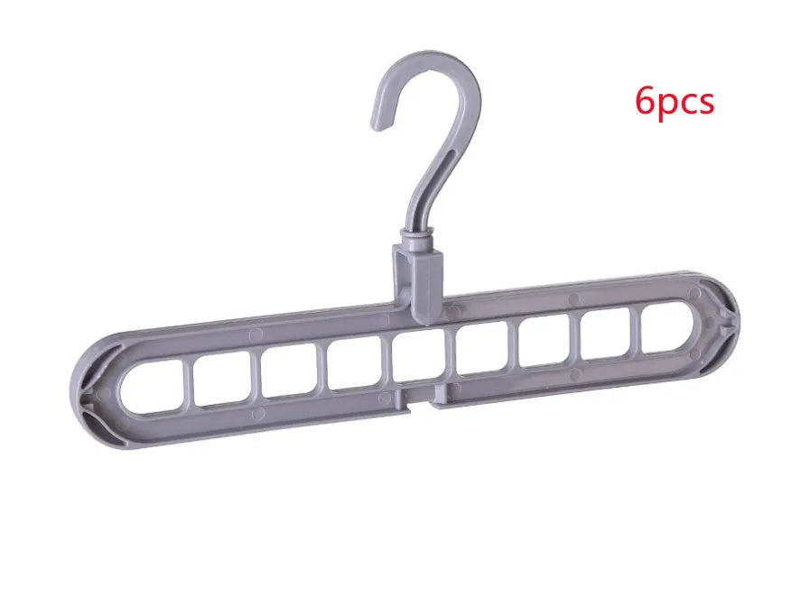 Plastic clothes hanger with rotating hook in pink colour, showing 33cm length dimension