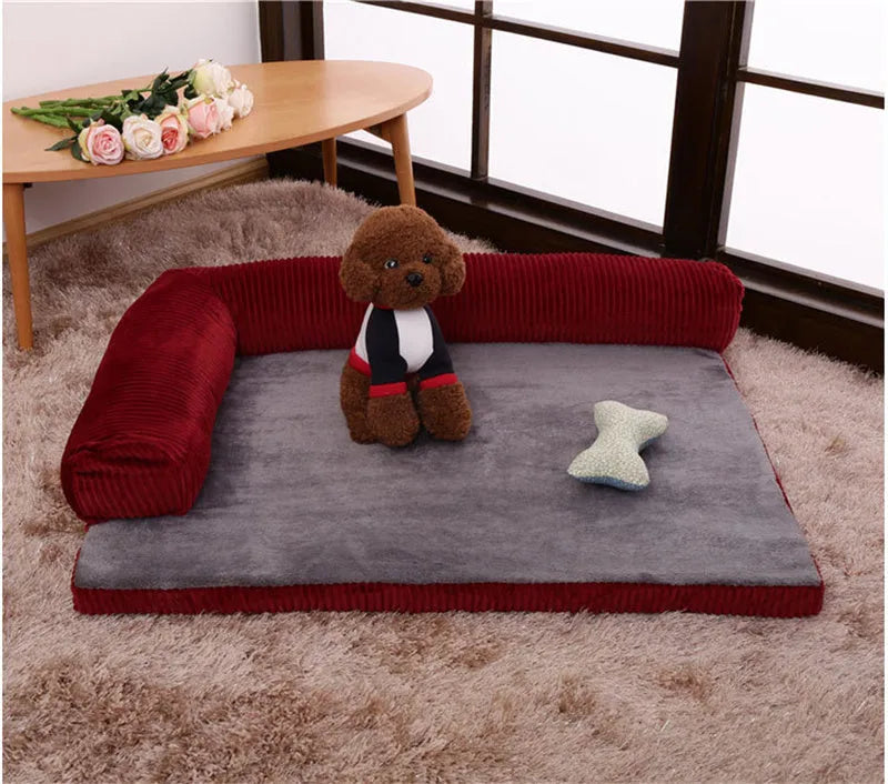 Corduroy bolster dog bed in grey, showing bilateral raised sides and non-slip base.
