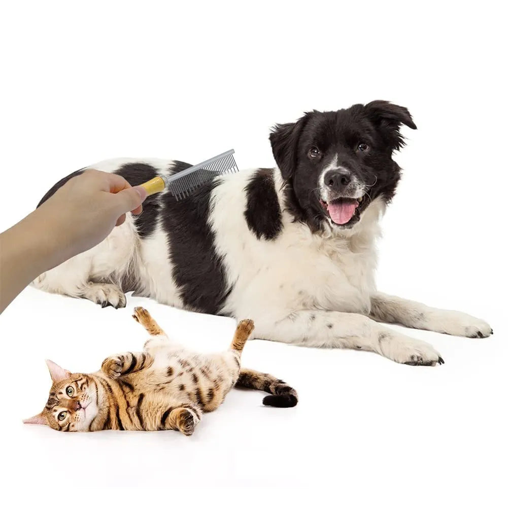 Wooden handle pet grooming comb for dogs and cats on a plain background.