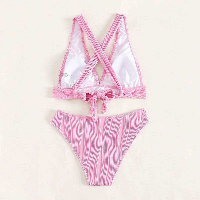 Women's pink halter strap bikini top with matching split shorts swimsuit bottoms