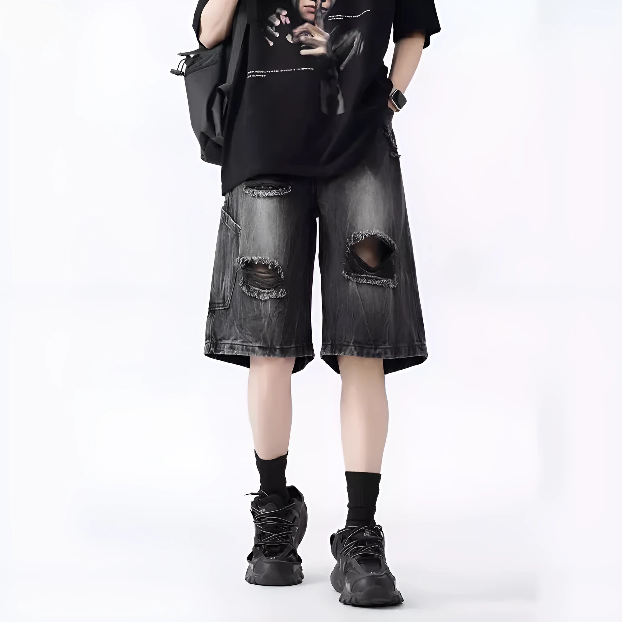 Men's vintage denim shorts with distressed detailing in loose fit design