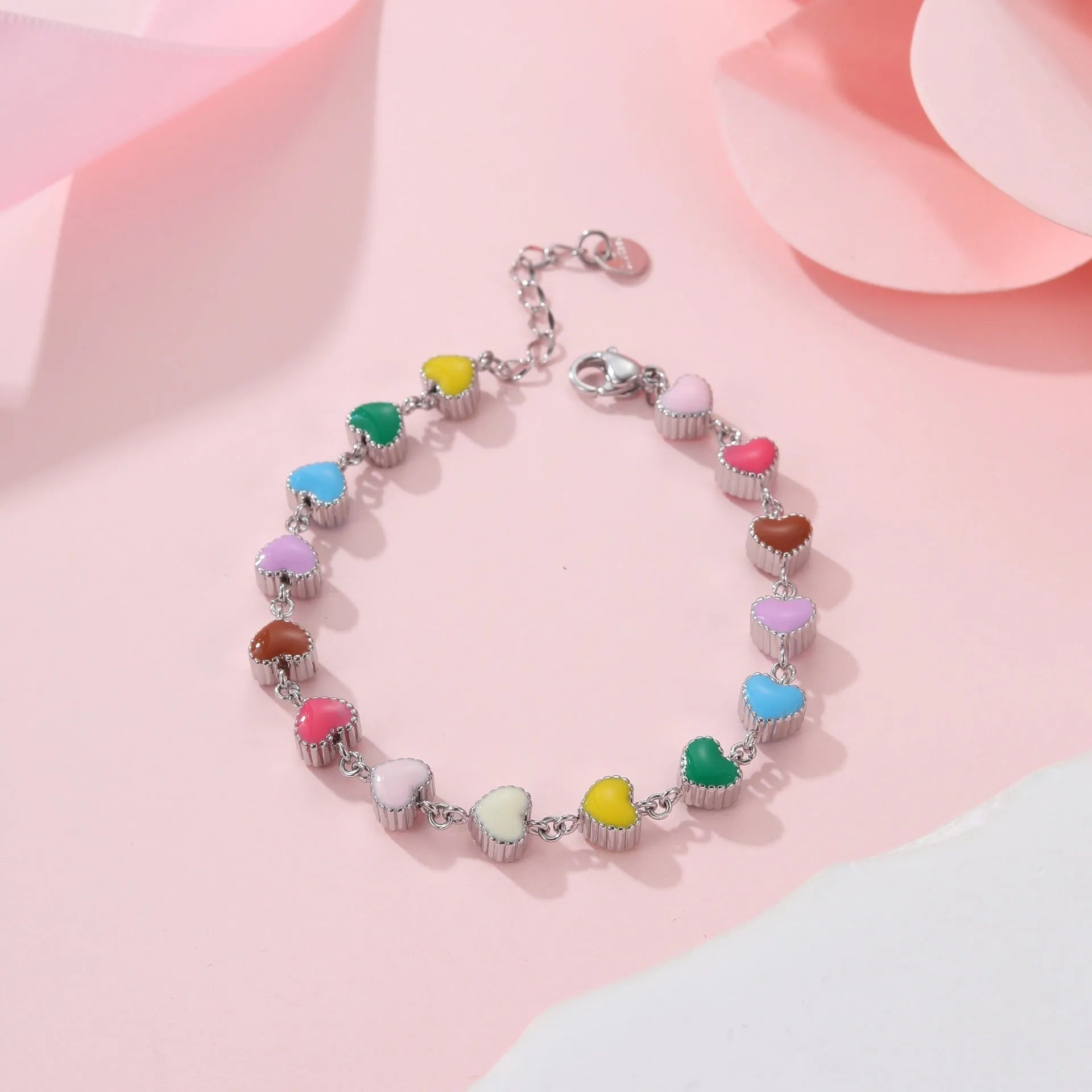 Gold or steel coloured heart-shaped titanium steel bracelet with electroplated finish for women's fashion wear