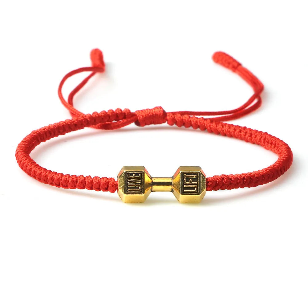 Woven dumbbell alloy bracelet in black-gold with electroplated finish on a white background