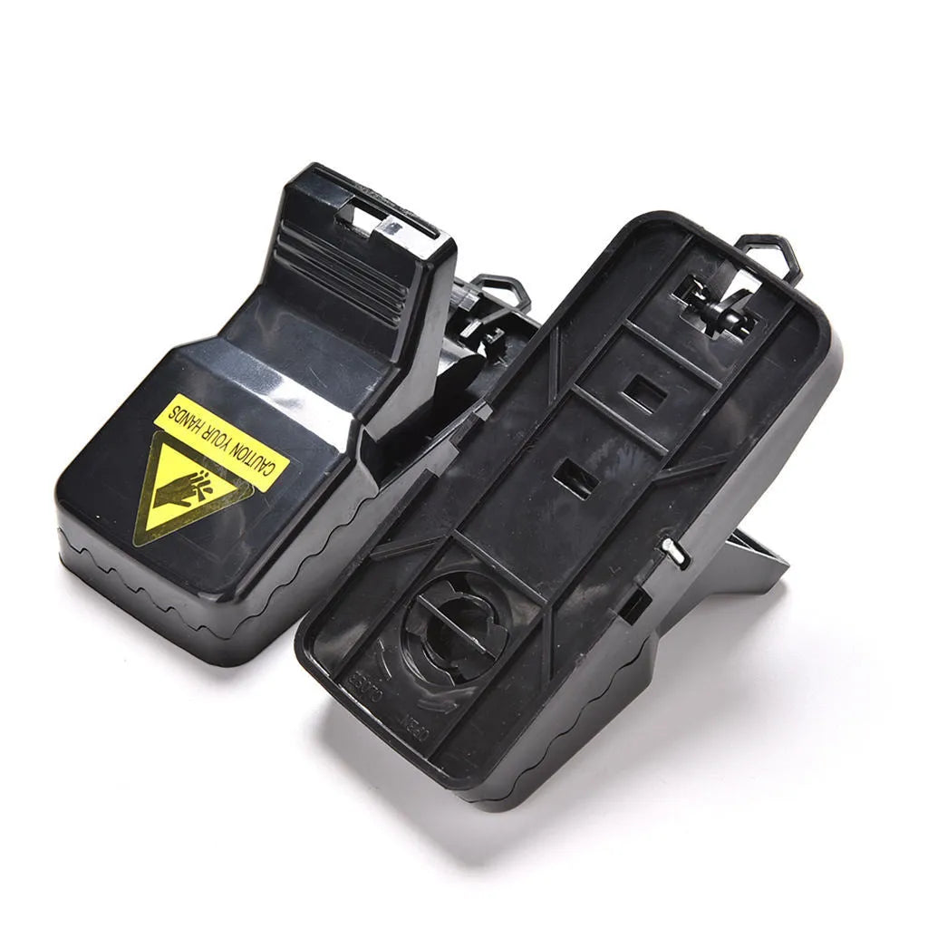 Six black snapping mousetraps made of PC+ABS plastic, shown with a ruler indicating 11cm length.