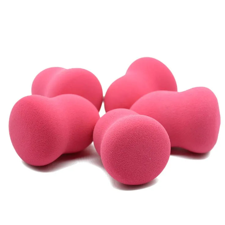 Pink hydrophilic non-latex makeup foundation sponge 4x4x5.6cm on white background