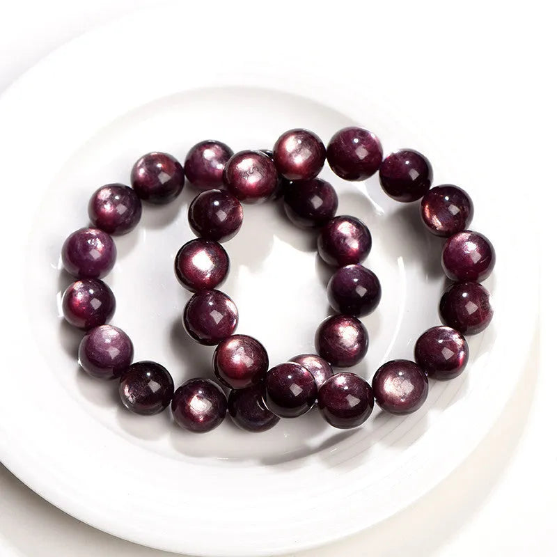 Natural purple lepidolite crystal bracelet with polished round beads in circular geometry