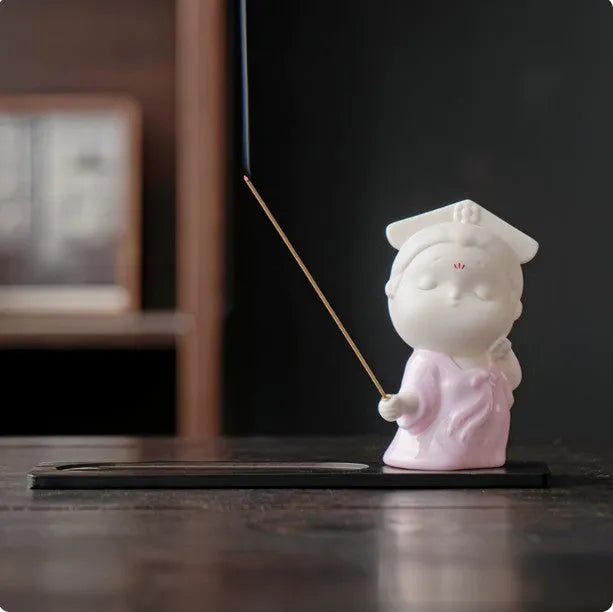 Small ceramic female court attendant figurine incense burner decoration in a cute style.